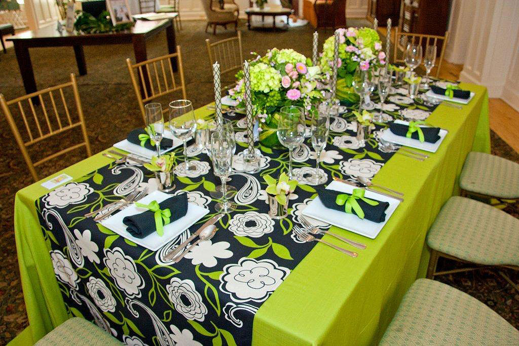 Wedding table setting with green and black linens Atlantic Hotel Berlin MD