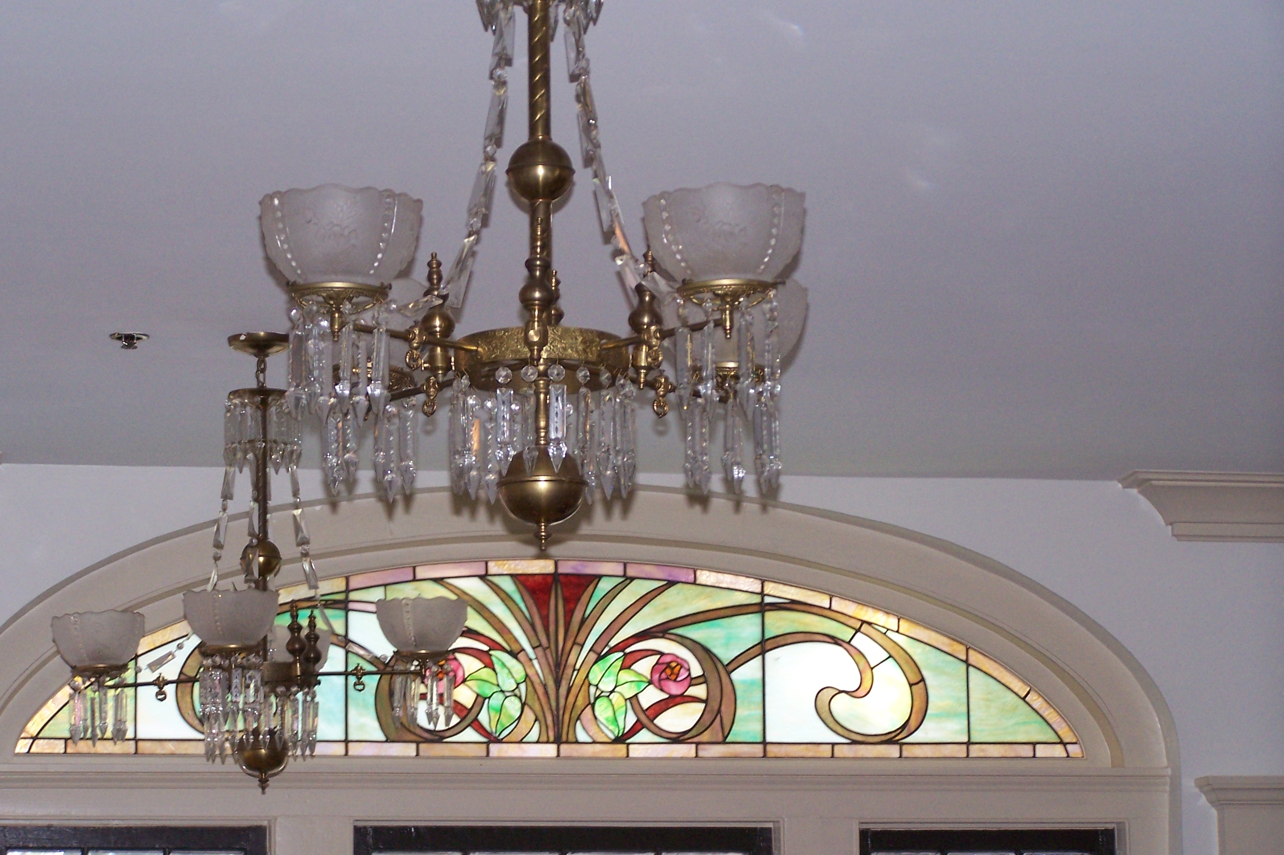 close up of chandelier by entrance