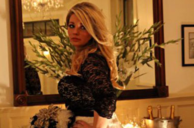 Bride Posing in Candlelight in the Ball Room Atlantic Hotel