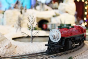 close up of train on track with wintery scene